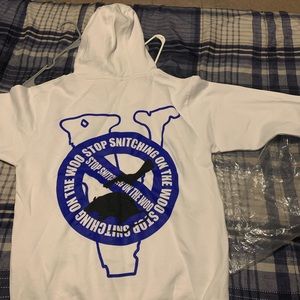 I’m selling a Vlone sweater size Medium and the colors are white and blue
